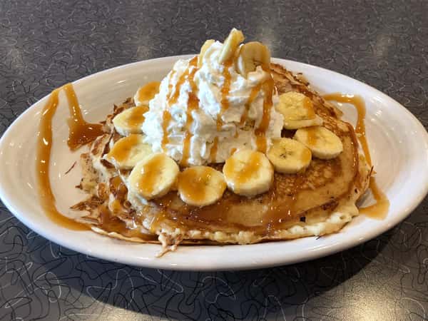 buttermilk pancakes with whipped cream and