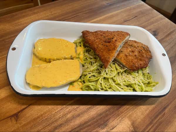 Basil pasta with chicken milanesa