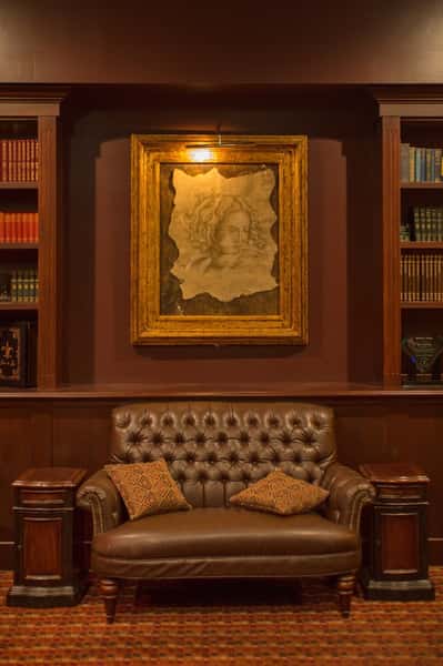 library lounge area with leather chair