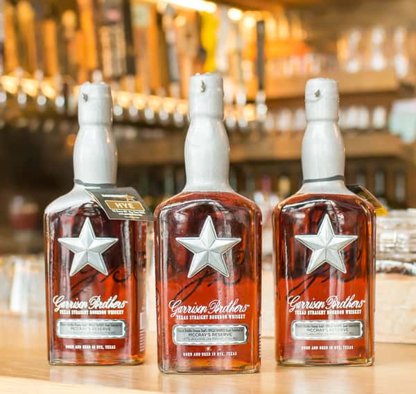 A wide selection of spirits and bottles behind the McCray's Tavern bar