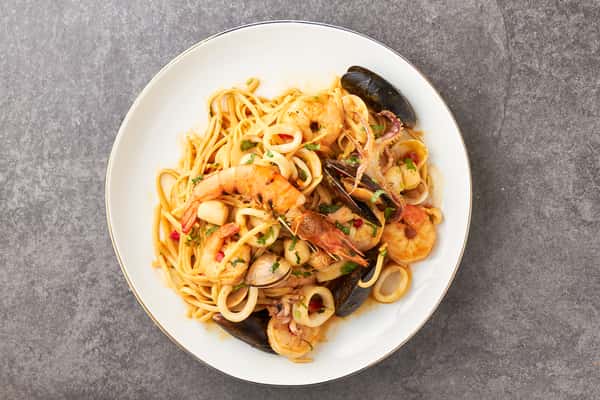 Tallarin Saltado Con Mariscos