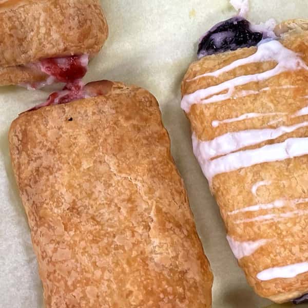 Fresh baked blueberry or raspberry cheese pockets