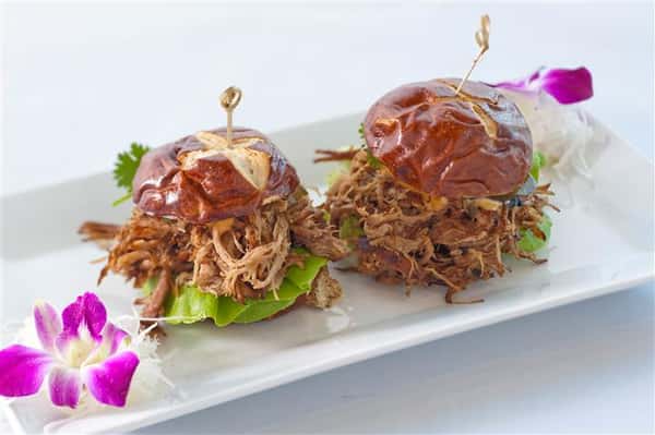 2 Burgers served with shredded beef and lettuce