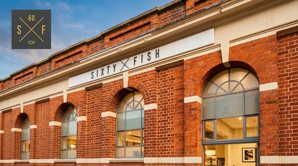 Exterior of the Sixty Fish shop on High Street in Coleshill, featuring its traditional red-brick frontage.