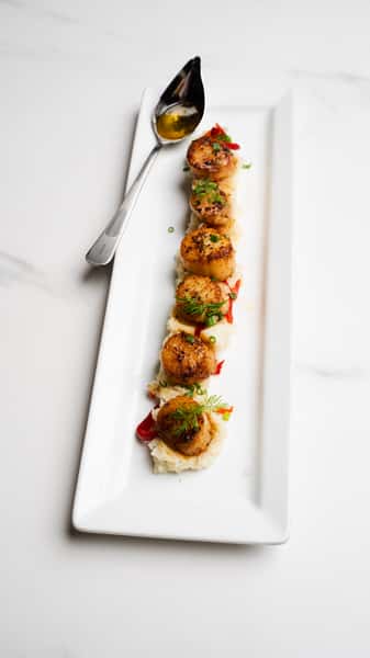 Scallops Over Risotto