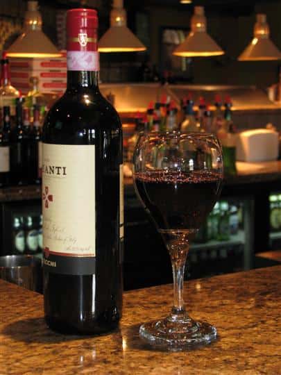 glass of wine and bottle of wine