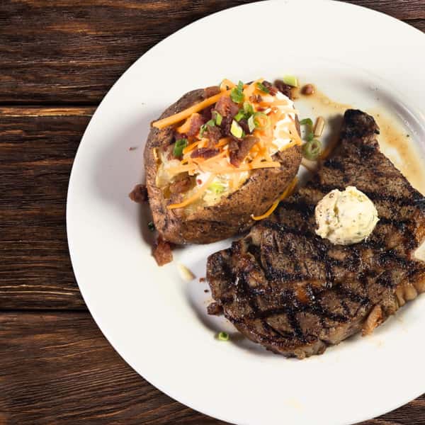 Ribeye and loaded baked potato