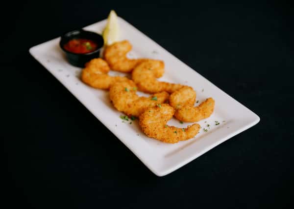 Jumbo shrimp hand-breaded in seasoned Japanese panko crumbs, flash-fried to golden perfection, served with cocktail sauce and lemon.