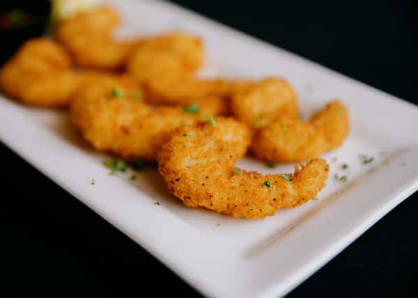 Jumbo shrimp hand-breaded in seasoned Japanese panko crumbs, flash-fried to golden perfection, served with cocktail sauce and lemon.