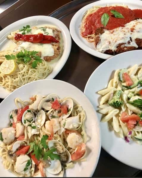 various italian dishes, shrimp and clam pasta, and chicken parmigiana, etc.