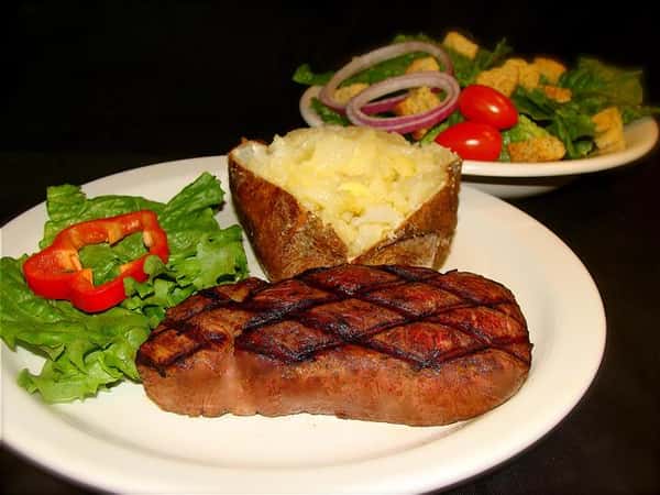 Steak, potato, and salad