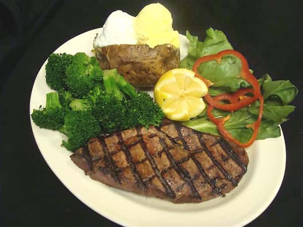 Steak, broccoli, and salad