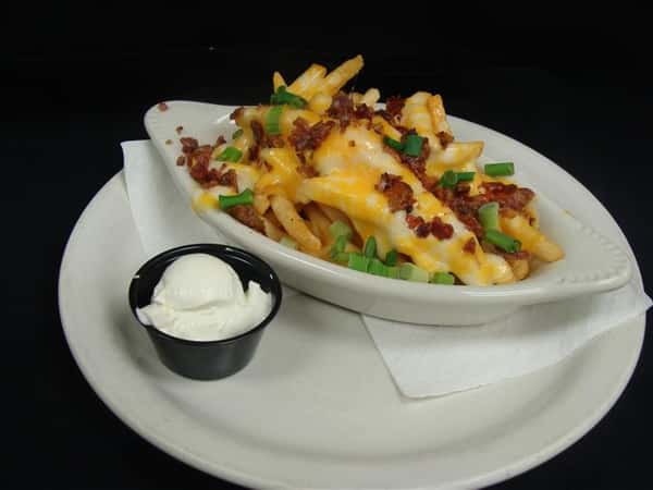 Fries, bacon, cheese, and sour cream