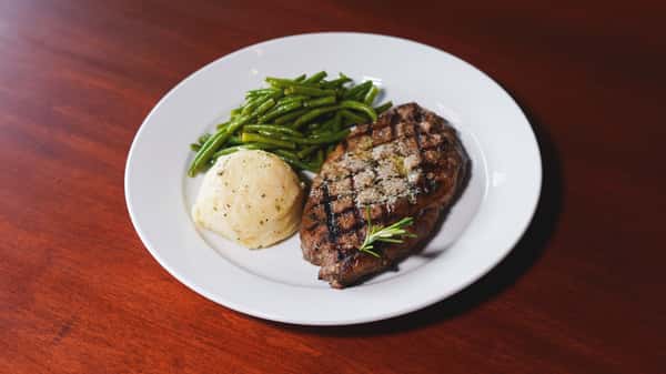 steak, mashed potatoes, and green beans