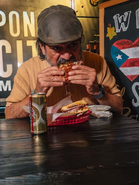 chef eating a sandwich