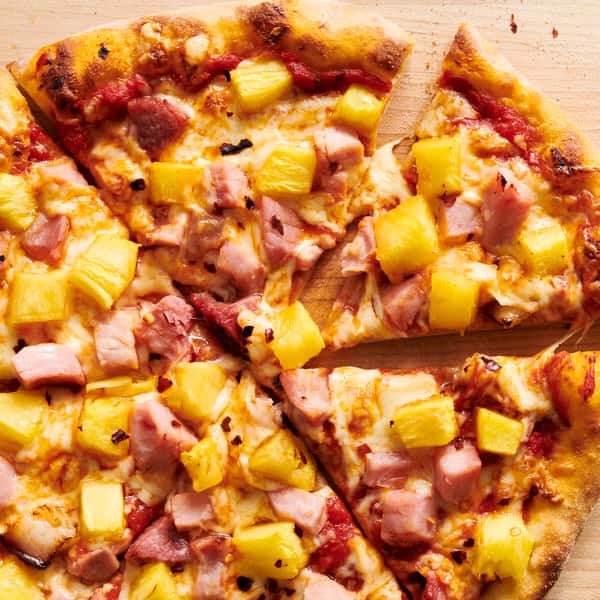 Fresh toast, pizza dough topped with our homemade pizza sauce, covered with a blend of the finest mozzarella cheese, topped with him and pineapples