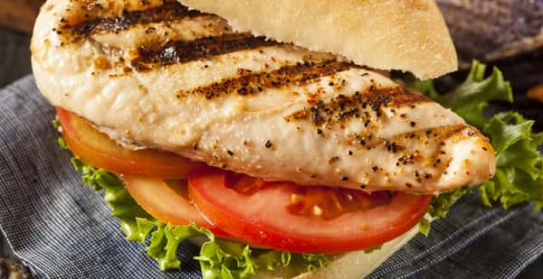 Grilled chicken seasoned with our own home seasoning grill to perfection served on a Kaiser roll with your choice of toppings