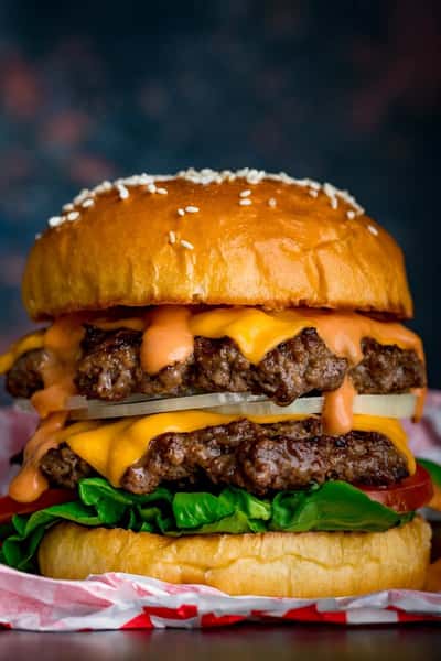 A pound of Angus burgers cook to perfection with our own house special seasoning
