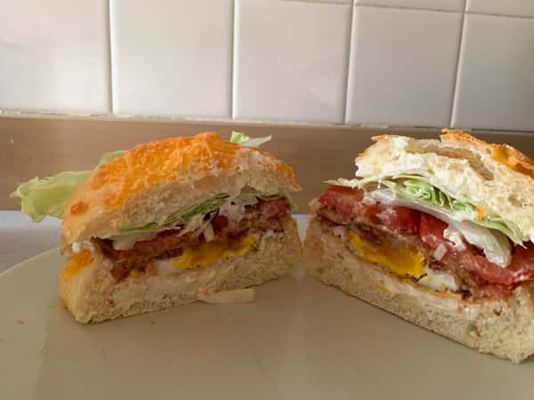 Bacon, eggs, cheese, lettuce, and tomatoes