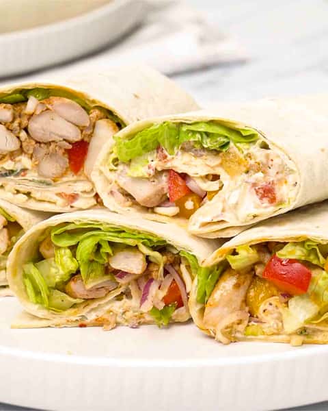 Roasted chicken, Swiss cheese, lettuce, tomatoes, sweet peppers, and chipotle mayonnaise