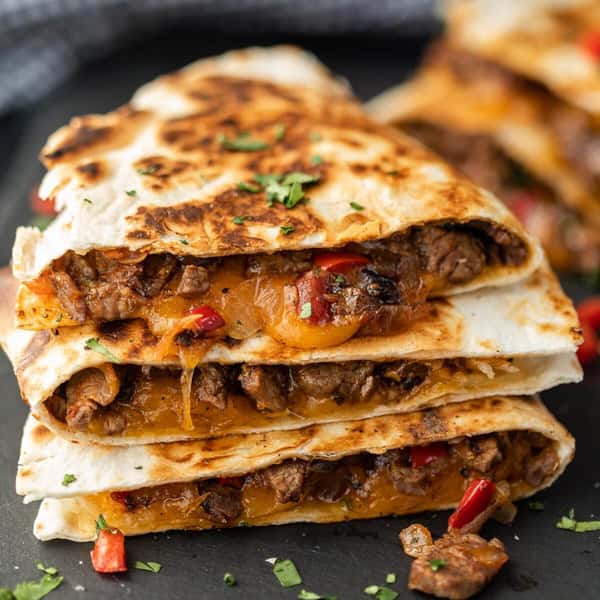 Chopped steak with mixed blanch cheese, grilled to perfection stuffed into a tortilla served with sour cream