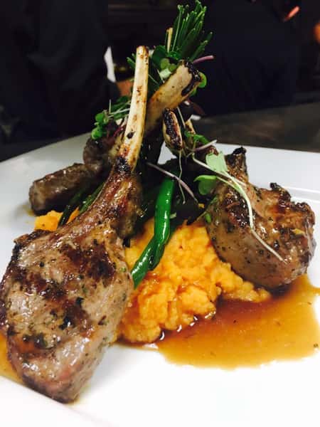 Lamb chops over mashed sweet poatates with string beans