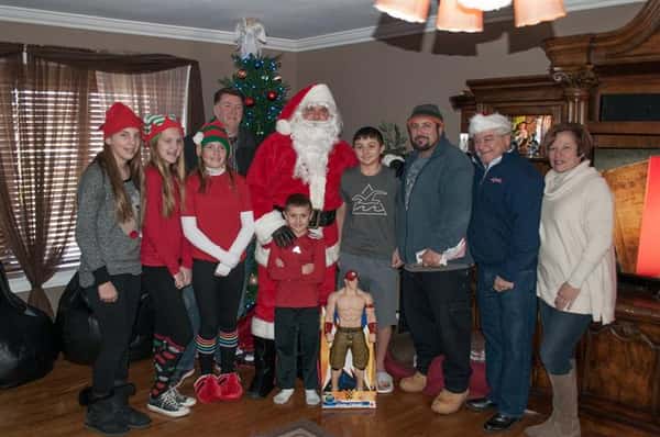 santa with family and gifts