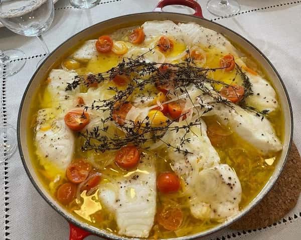Chilean Sea Bass over a julienne of vegetables (6-8)