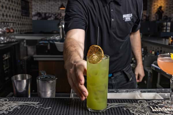 Bartender serving drink