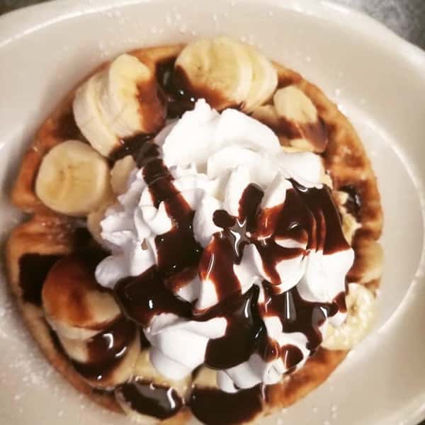 Waffle with Bananas, Whipped Cream & Chocolate sauce