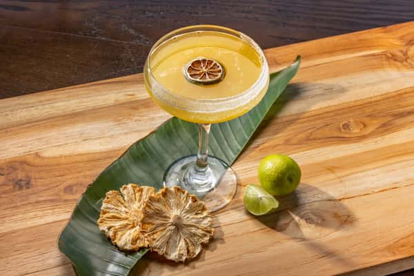 Mi Pasión cocktail featuring pineapple and passion fruit