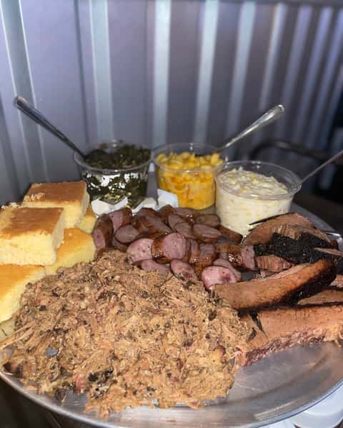 Bring everyone to the table for Family Platter at Double S Smokehouse 😋 Built to serve 4-6, it comes loaded with brisket, pulled pork, half chicken, half rack of ribs, three sides, and 4 cornbread. Big variety, bold smokehouse comfort, and plenty to pass around.

#DoubleSSmokehouse #FamilyPlatter #BBQFeast