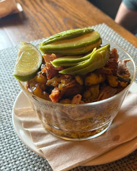 Saturday nights call for Dominican Sundae at Double S Smokehouse 😍 Rice & Beans, Maduro, Roast Pork, Avocado, and a squeeze of Lime come together in one seriously craveable plate. Don't miss Dominican Sundae this Saturday night! 🔥🥑 #DoubleSSmokehouse #DominicanSundae #SaturdayNights #RoastPork