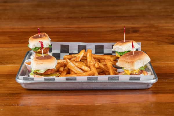 Chicken sliders served on a tray with crispy fries at Nara Cafe Houston.