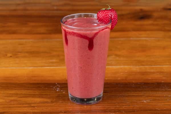 Mixed berry smoothie with fresh strawberry at Nara Cafe in Houston.