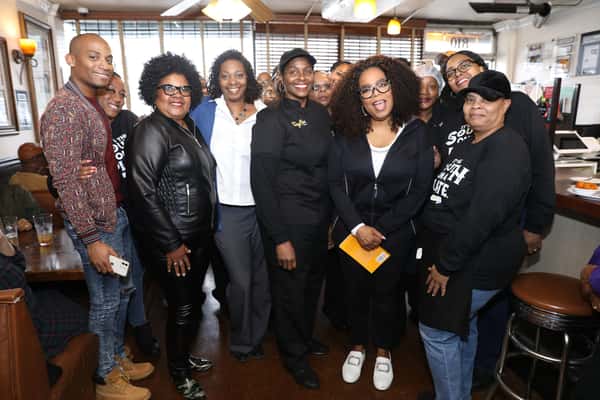 Oprah Winfrey with Tracy Gates and staff members
