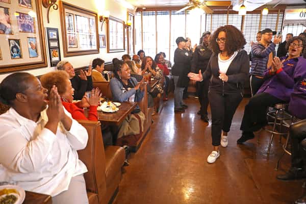 Oprah greeting diners at The Busy Bee