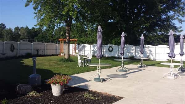 Outdoor shot of Bella Domani's garden tables with umbrellas