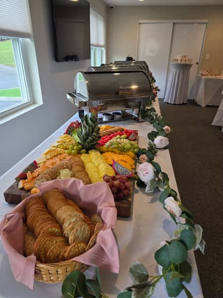 Catering event with a lot of food on a table