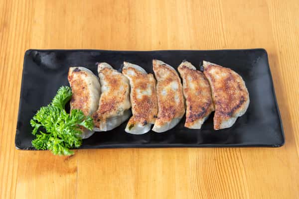 A plate of fried goyozas