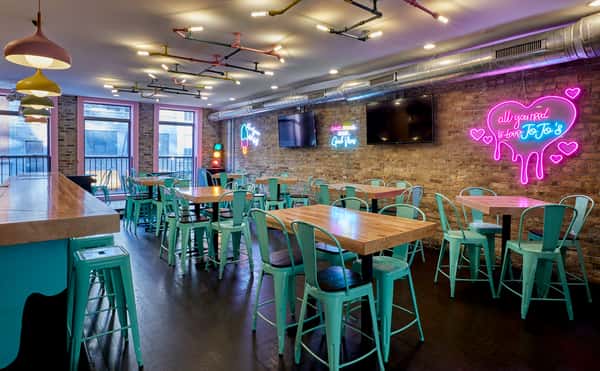 The second floor of JoJo's shakeBAR. Nicknamed "The Playroom", this floor is a perfect place to host an event with a full bar and customizable Lite Brite