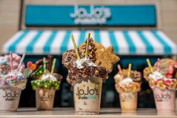 The Gold Digger Biggie Shake in front of every Biggie Shake and the JoJo's Detroit store front