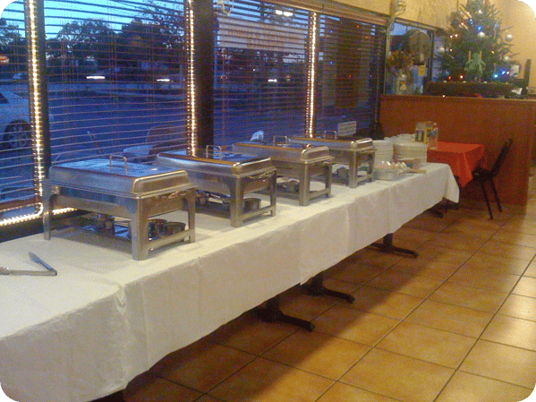 Catering sternos on long table
