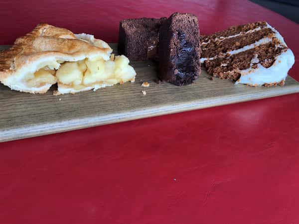 tray of desserts: apple pie, brownie and carrot cake