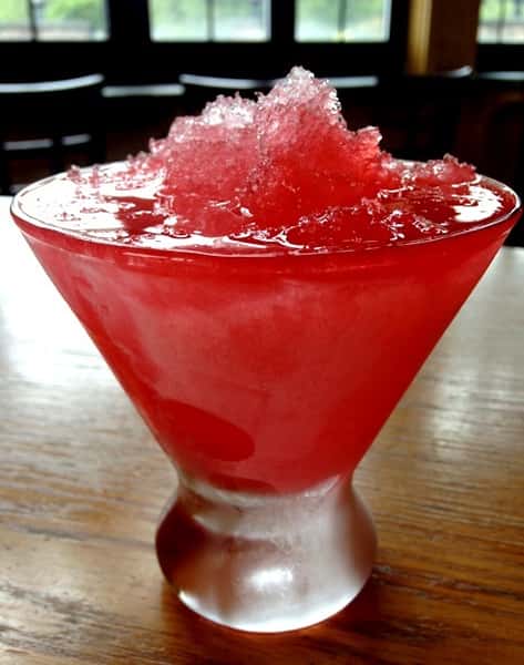 Red cocktail with shaved ice