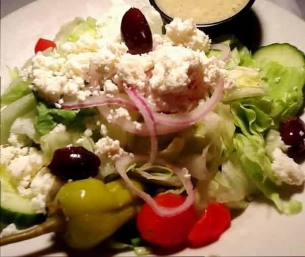 Salad with olives, feta cheese, abd peppers