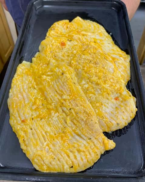 Skip's Famous Cheesy-Garlic Marinated Chicken Breast $6.99 lb.