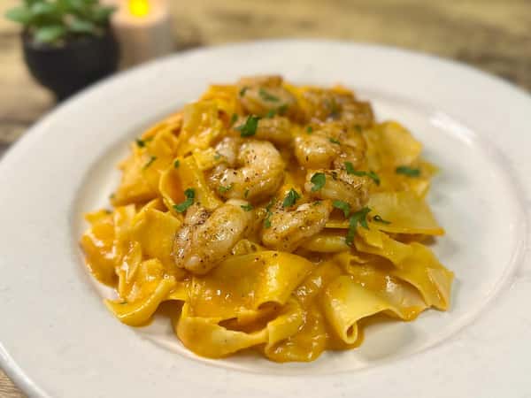 Blackened Shrimp on Peach and Red Bell Pepper Sauce tossed Pappardelle