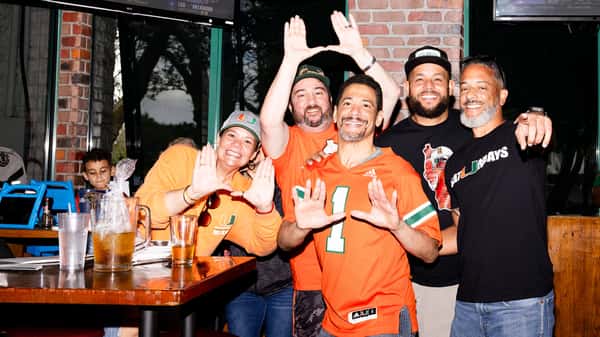 Miami fans cheering at Carolina Ale House