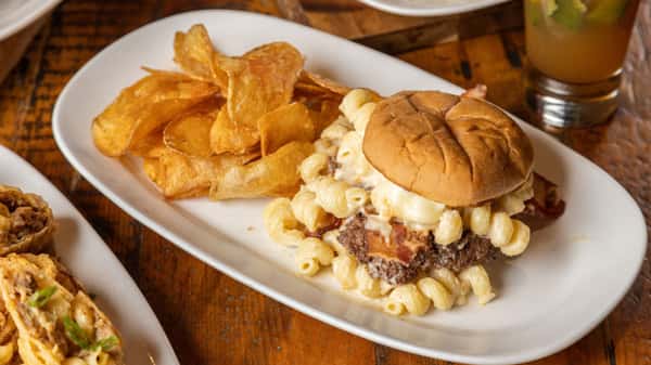 Picture of a cheeseburger with mac and cheese
